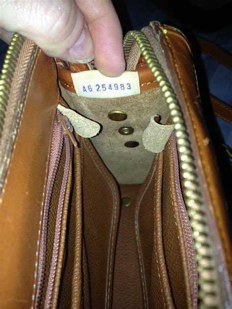 how to spot a fake dooney and bourke bag|dooney and bourke verify authenticity.